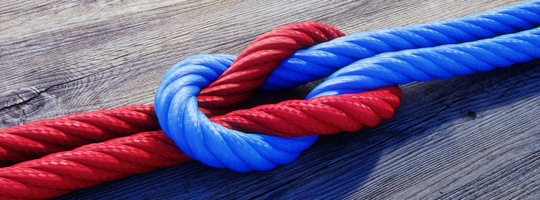Red and blue rope tied in a knot