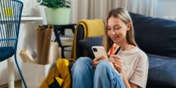 Gen Z person on their phone using a banking app