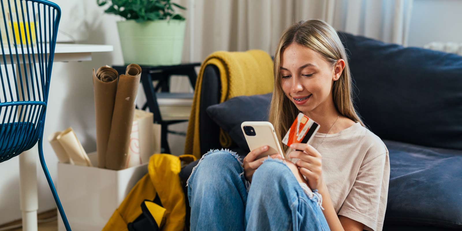 Gen Z person on their phone using a banking app